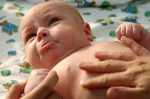 вздутие живота у новорожденного